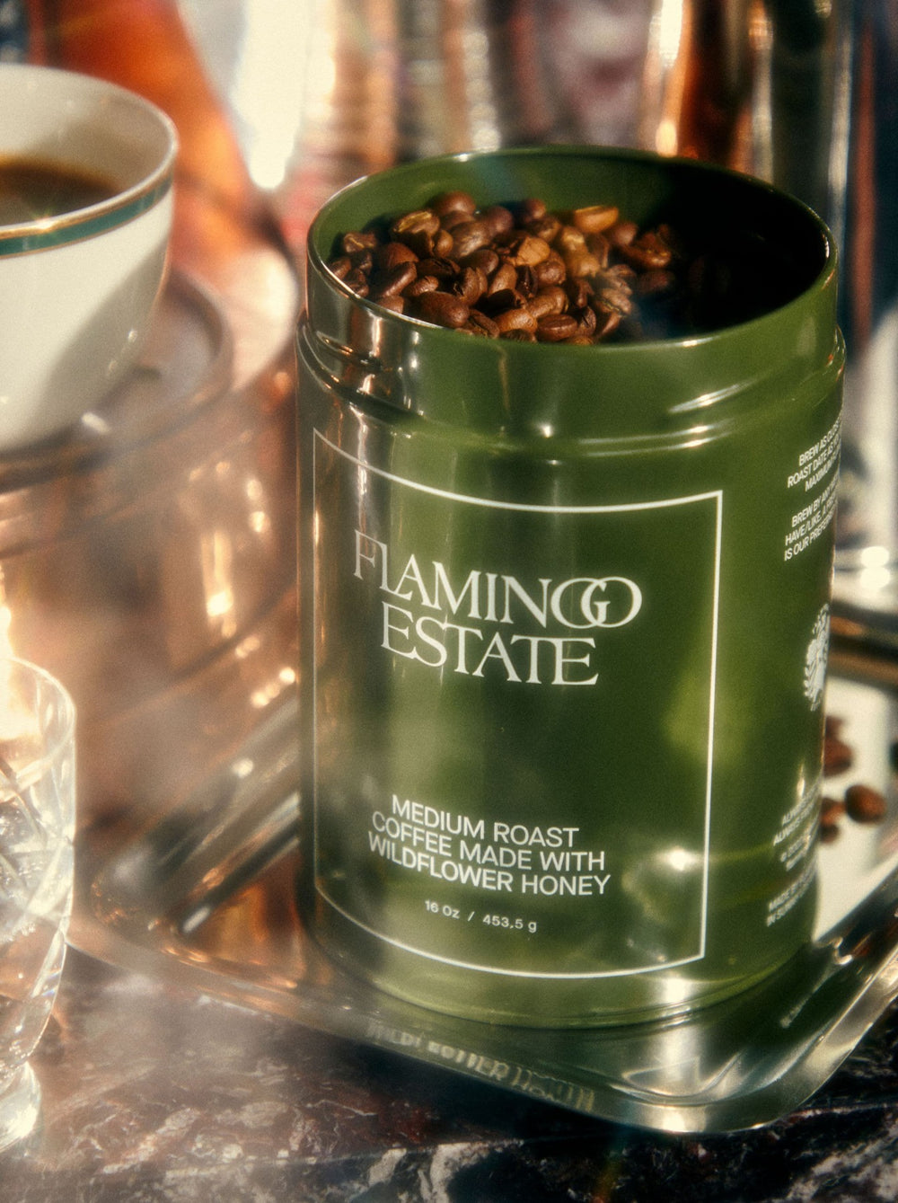 A green canister labeled