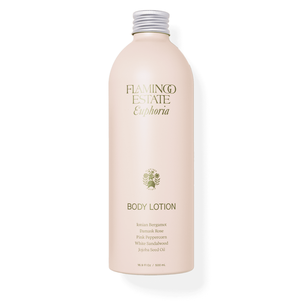 A sleek, light pink bottle labeled