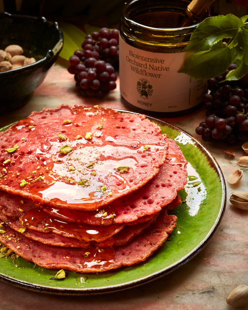 Pink Baghrir (Morrocan Semolina Pancakes)with Orange Blossom Honey