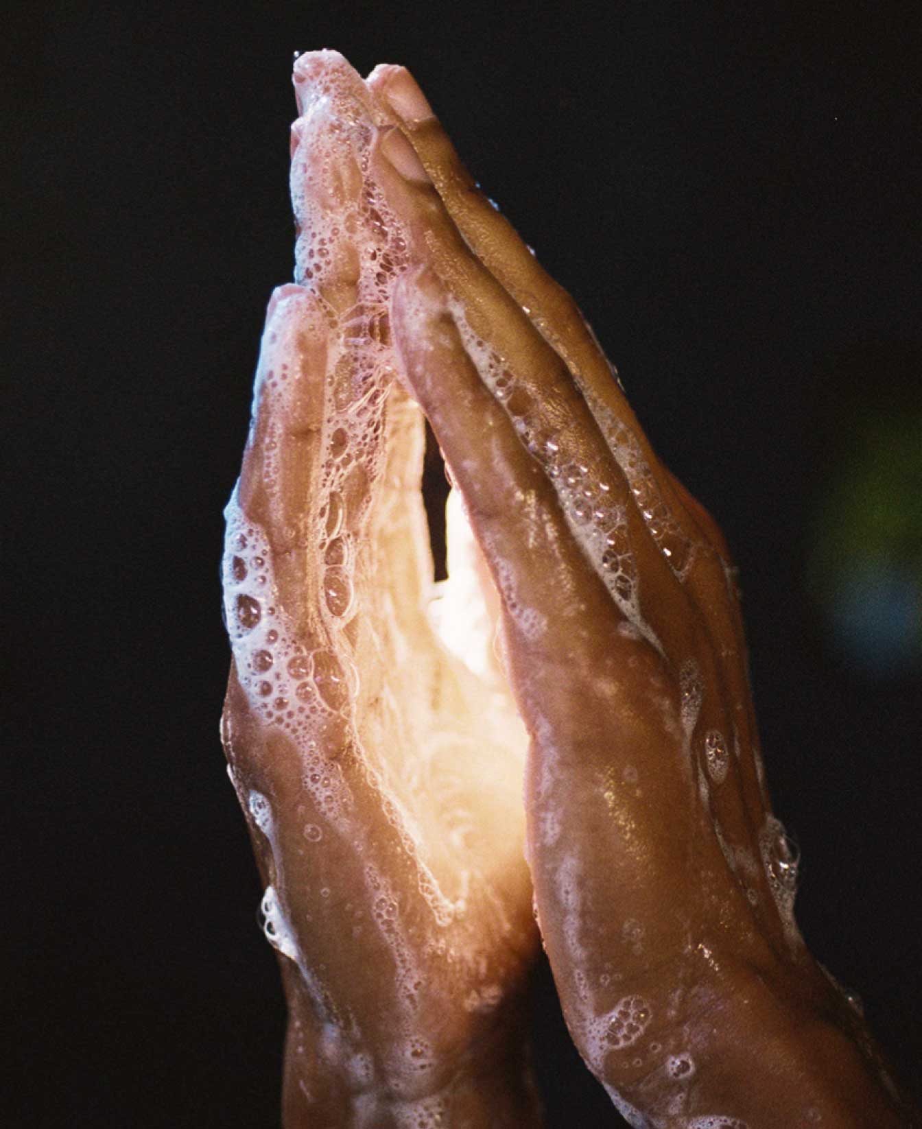 Two Hands Covered In Foamy Soap