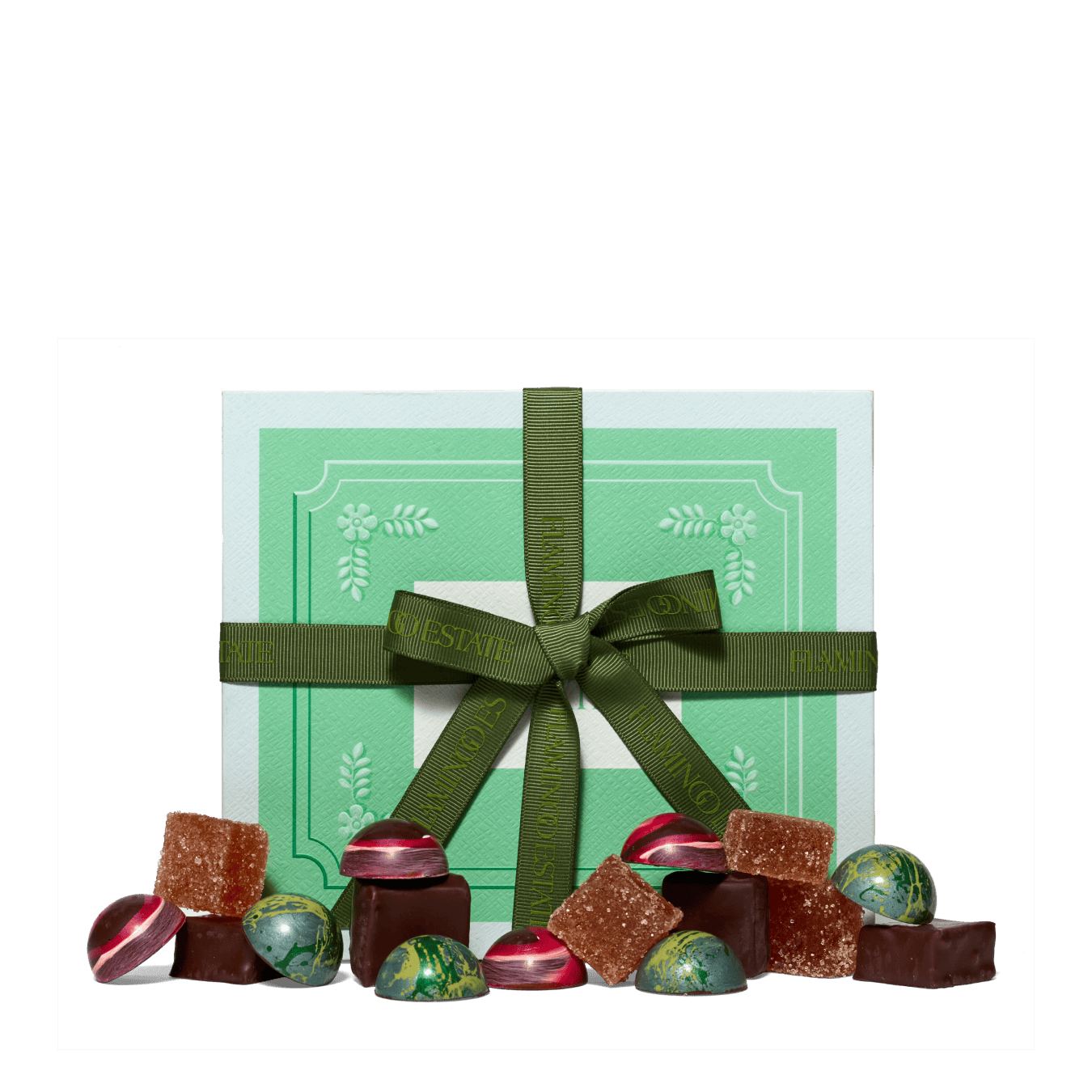 Bon Bon Chocolate Set with green packaging and a ribbon, surrounded by assorted chocolates and wrapped candies.