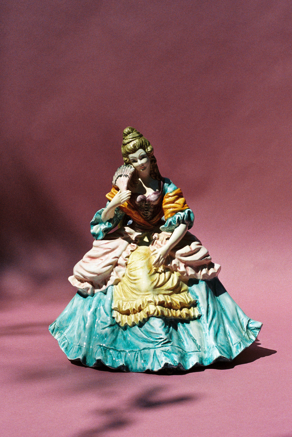 Large Porcelain Figure With Blue and Yellow Dress