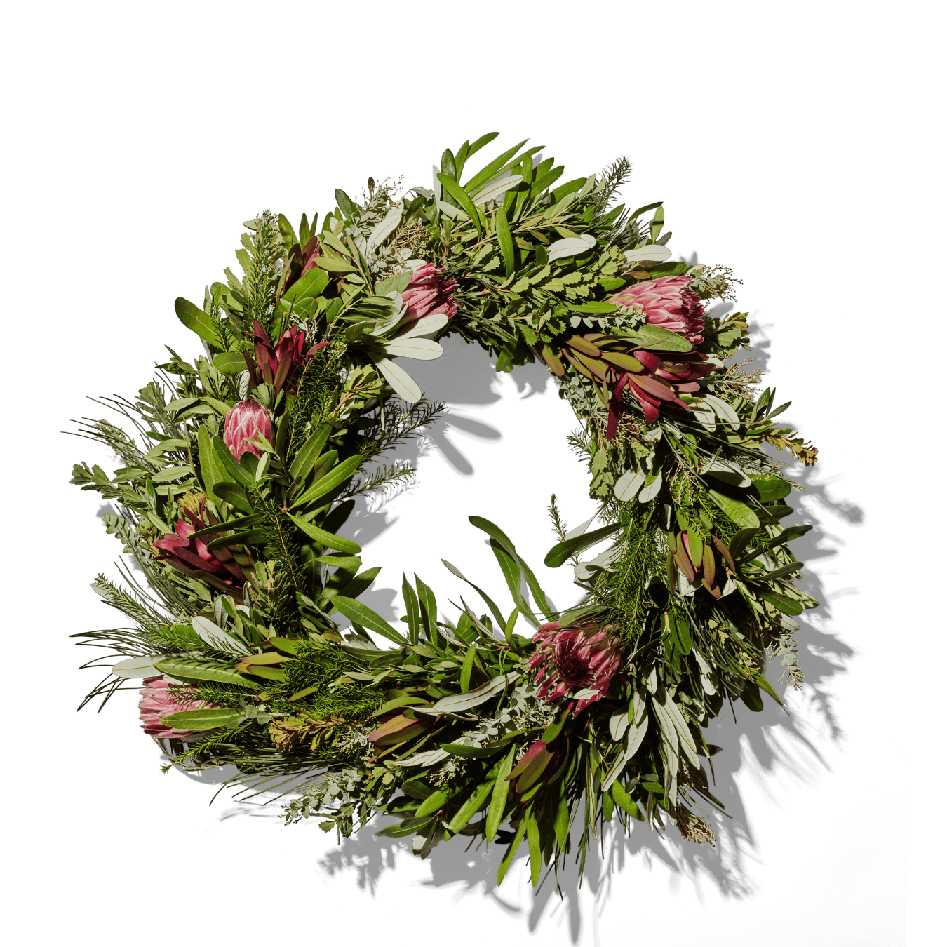 Organic Queen Protea Wreath with lush greenery and pink protea flowers