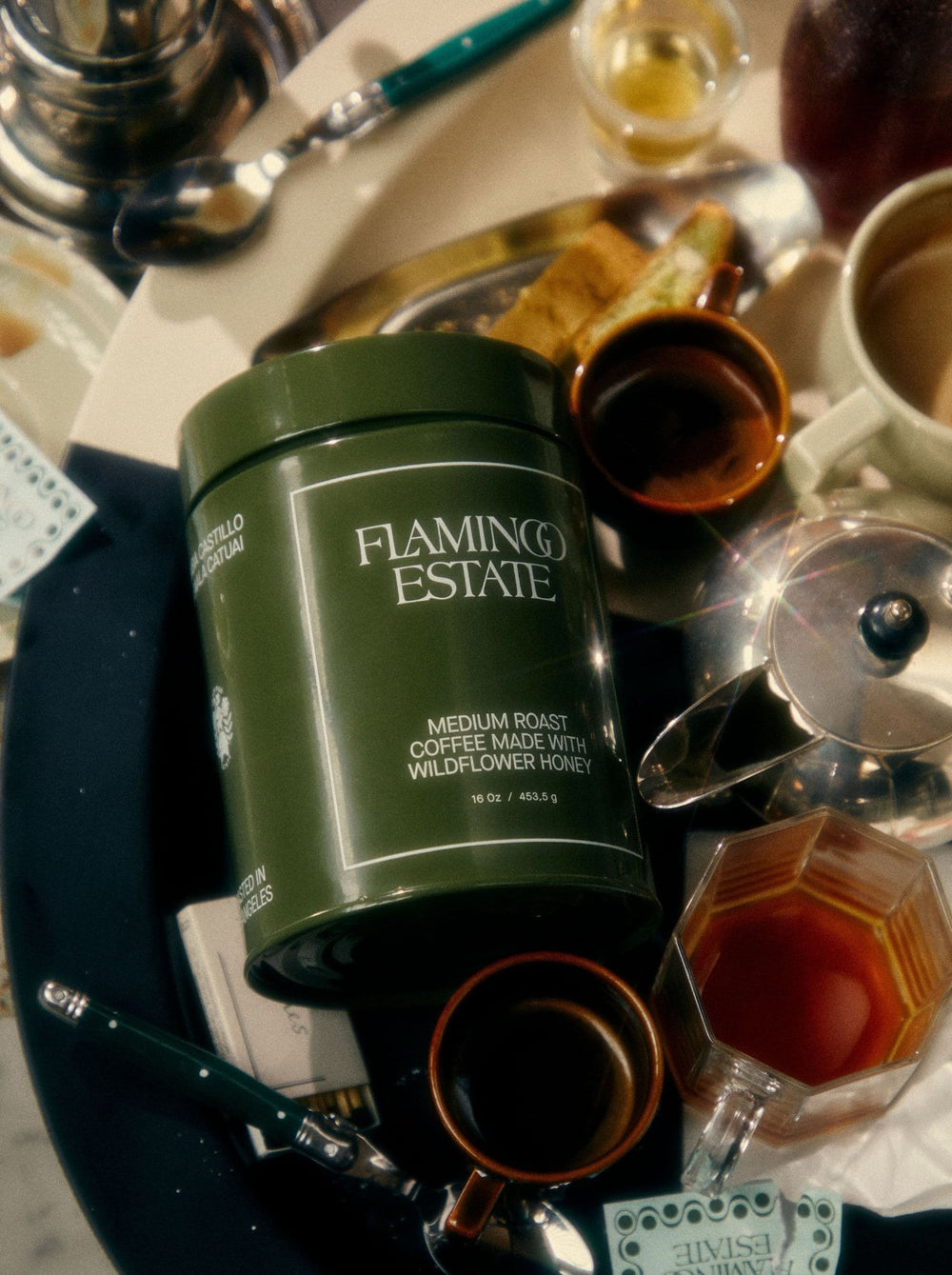 A green container labeled 