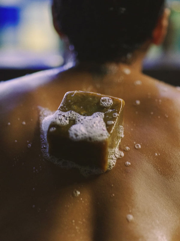Foaming Bar Soap On Someone's Back