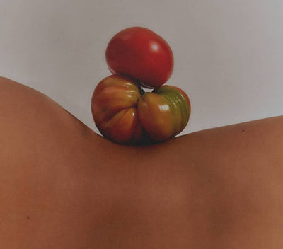 Tomatoes Balanced On Someone's Body